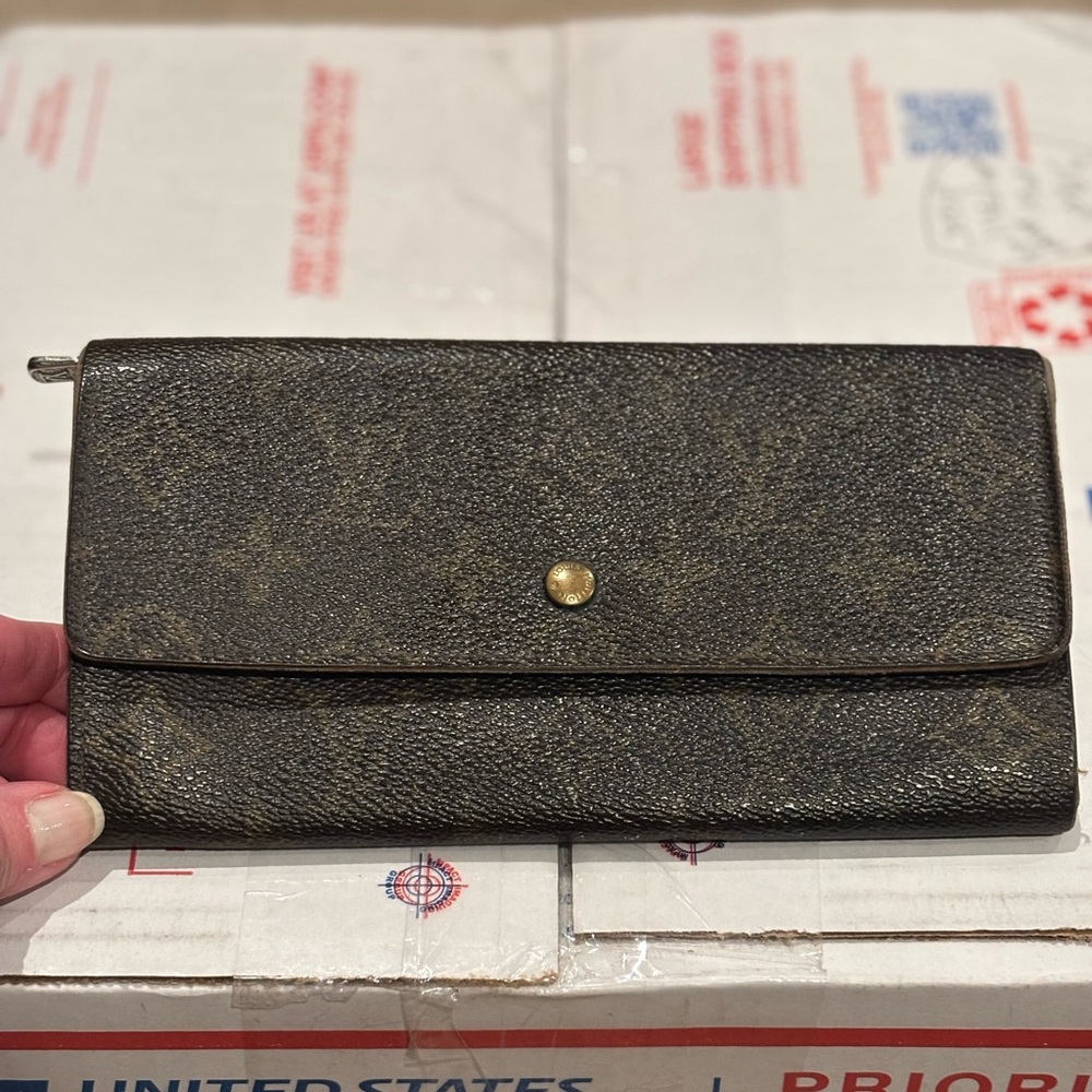 Louis Vuitton Elegant Brown Sarah Wallet with Gold Button